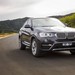 2014 BMW F26 X4: red front quarter