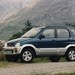 1997 Daihatsu J100 Terios: blue side angle