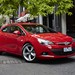 2013 Vauxhall Astra GTC: red front quarter