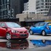 2011 Holden TM Barina 3dr and 5dr: red and blue two shot