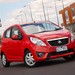 2010 Holden MJ.I Barina Spark 3dr: red front quarter (Australia)