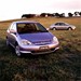 2000 Honda ES1/EU3 Civic: hatchback forefront and sedan background (Australia)