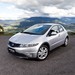 2009 Honda FK2 Civic Si: silver front quarter mountains