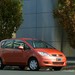 2004 Mitsubishi RG.I Colt LS: orange front quarter (Australia)