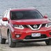 2014 Nissan T32 X-Trail Ti: red front angle on beach (Australia)