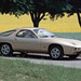 Porsche 928: gold side front angle