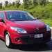 2010 Renault X32.I Megane Dynamique: red front angle driving (Australia)