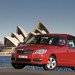 2007 Skoda 5J.I Roomster: red front quarter in front of Sydney Opera House (Australia)