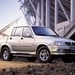 2004 Ssangyong Musso Sports: silver front quarter