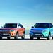 2015 Suzuki Vitara: orange and teal, facing forwards